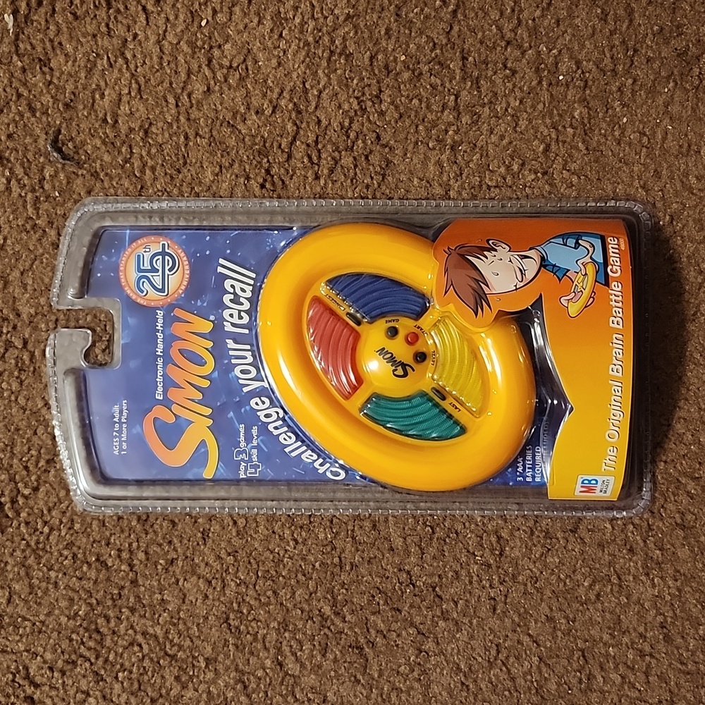 Simon hand-held car entertainment kids toy electronic skill solo or team play